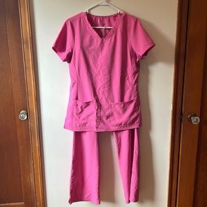 Pink scrub set. Top size medium, bottoms size large.